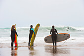 Surf class on Zurriola beach, district of Gros, San Sebastian, Bay of Biscay, province of Gipuzkoa, Basque Country, Spain, Europe