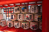 Sake barrels with traditional paintings, at Itsukushima Shrine, Shinto temple, on Miyajima Island, UNESCO World Heritage Site, Hiroshima Prefecture, Honshu, Japan, Asia