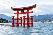 Landmark Otori gate in sea at high tide, Torii Gate of Miyajima, UNESCO World Heritage Site, Hiroshima Prefecture, Honshu, Japan, Asia