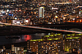 Juso Bridge aerial view, highway and railway bridges crossing the Yodo River, night skyline, Osaka, Honshu, Japan, Asia