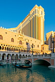 Gondola rides in canal The Venetian Las Vegas Hotel at sunset, Las Vegas Strip, Paradise, Las Vegas Boulevard, Las Vegas, Nevada, United States of America, North America