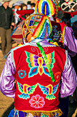 Back view of Peruvian man in traditional dress on celebration, Chinchero, Peru, South America