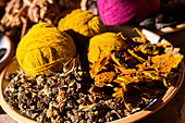 Balls of wool with bark and herbs as natural dye, Chinchero, Sacred Valley, Peru, South America