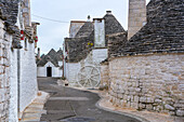 Alberobello iconic old Trullo and Trulli white houses with stone ceilings in conical shape, UNESCO World Heritage Site, Alberobello, Apulia, Italy, Europe