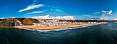 Aerial drone panoramic view of Nazare beach and Nazare city on a sunny day, Nazare, Oeste, Estremadura, Portugal, Europe