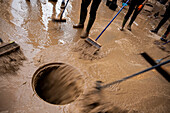 People cleaning. Effects of the DANA floods of October 29, 2024, Convent street, Paiporta, Comunidad de Valencia, Spain