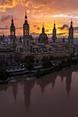 Aerial view of El Pilar Basilica Cathedral and the Ebro River at sunset, Zaragoza, Spain