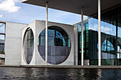 The Marie-Elisabeth-Lüders-Haus showcases contemporary design in Berlin, situated by the river and reflecting modern German architecture.