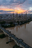 Aerial view of El Pilar Basilica Cathedral and the Ebro River at sunset, Zaragoza, Spain