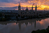 Aerial view of El Pilar Basilica Cathedral and the Ebro River at sunset, Zaragoza, Spain