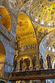 Statues of the apostles on the Gothic altar screen enclosing the chancel in St. Mark's Basilica, Venice, Italy.