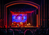 Granada, Spain, Nov 1st 2024, Theo Crocker and his band perform a captivating jazz concert at Teatro Isabel la Catolica during the Granada Jazz Festival, showcasing musical talent and vibrant visuals.