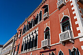 Rear facade of the historic Hotel Danieli on the Riva degli Schivoni quayside promenade in Venice, Italy.