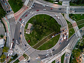 Aerial view of a roundabout in Zaragoza with traffic and tram, Spain