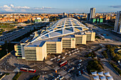 Aerial view of Zaragoza–Delicias railway and central bus station at sunset