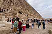 Tourists at the Great Pyramids complex, Giza, Egypt.