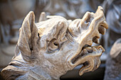 Rome, Italy, July 22 2017, This dragon head sculpture, part of the Gregory XIII monument, captures intricate details and artistry in Saint Peter's Basilica.