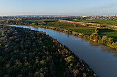 Aerial view of the Ebro River passing by La Alfranca area in Zaragoza, Spain