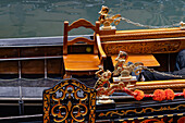 Detail of a gondola in Venice, Italy, showing brass seahorses.