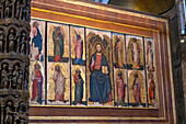 A painted altarpiece of Christ and the Apostles behind the high altar of St. Mark's Basilica, Venice, Italy. Painted in the 15th Century.