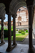 Rome, Italy, July 22 2017, The serene cloister of Lateran showcases elegant arches and lush greenery, highlighting the peaceful atmosphere of this historic site.