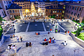 Rome, Italy, July 22 2017, The Spanish Steps come alive at dusk, filled with visitors enjoying the ambiance and beauty of Rome.