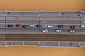 Aerial view of an abundant Ebro River passing under the Bridge after the Dana, Zaragoza, Spain