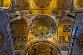 A gold mosaic on the north (John) cupola, St. Mark's Basilica, Venice, Italy. This mosaic depicts events from the life of St. John the Evangelist. Circa late 12th Century A.D.