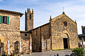 The Church of Santa Maria Assunta or Church of Saint Mary in the walled medieval town of Monteriggioni, Italy.