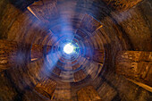 Looking up in the 54 meter deep St. Patrick's Well, built in 1527, in the hilltop town of Orvieto, Italy.