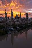 Aerial view of El Pilar Basilica Cathedral and the Ebro River at sunset, Zaragoza, Spain