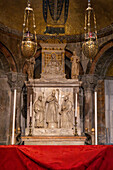 Bas relief sculptures and gold mosaics in St. Clement's Chapel in St. Mark's Basilica in Venice, Italy.