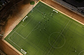 Aerial view of a training in a soccer field at night