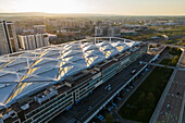 Aerial view of Zaragoza–Delicias railway and central bus station at sunset