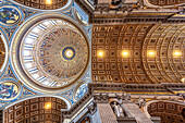 Rome, Italy, July 22 2017, Elaborately decorated ceiling and dome of St Peter's Basilica in Rome.