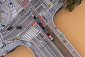 Aerial view of an abundant Ebro River passing under the Bridge after the Dana, Zaragoza, Spain