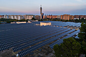 Aerial view of photovoltaic power station in Casablanca water treatment plant and Movistar Telecommunications tower, Zaragoza, Spain