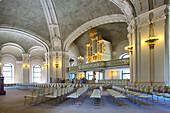 Berlin, Germany, July 29 2009, Explore the grand interior of the Französische Dom, featuring elegant seating and architectural details in the heart of Berlin.