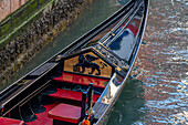 Detail of the traditional decoration of a gondola in Venice, Italy.