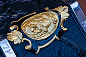 Detail of the traditional decoration of a gondola in Venice, Italy.