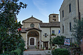 The arched Romanesque gateway of the Benedictine Abbey of Santa Maria of Farfa, Italy.