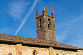 The Church of Santa Maria Assunta or Church of Saint Mary in the walled medieval town of Monteriggioni, Italy.