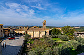 The Church of Santa Maria Assunta or Church of Saint Mary in the walled medieval town of Monteriggioni, Italy.