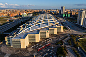 Aerial view of Zaragoza–Delicias railway and central bus station at sunset