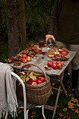 Woman serves apple cider