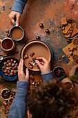 Woman reaching for chocolate bears