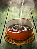 Pour hot water over chestnuts