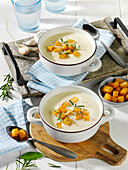 Garlic soup with rosemary and croutons