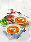 Carrot and prosecco soup with Bündner meat