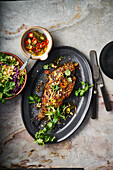 Baked sea bream with colourful Asian salad and chilli pickles